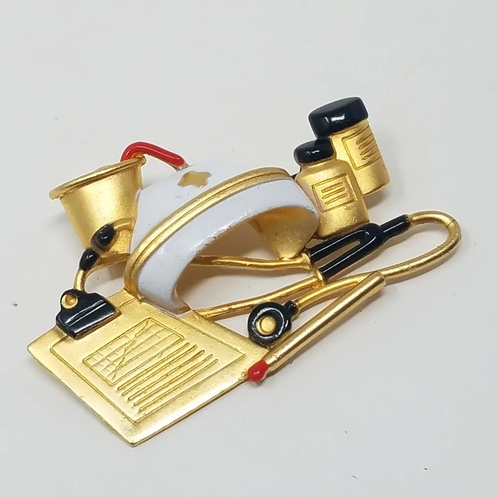 Vtg AJC gold tone‎ retro nurse themed brooch